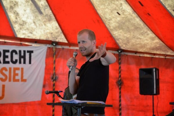 Swedish climate academic Andreas Malm speaking at an event in 2018.