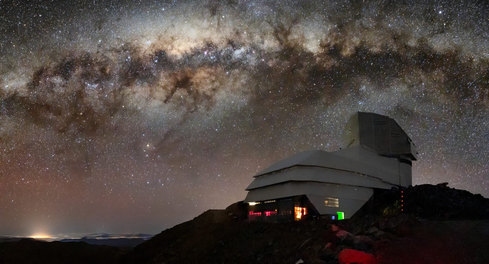The Vera C. Rubin Observatory in Chile beneath the Milky Way at night.