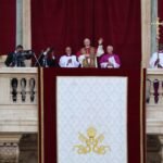 Pope Leo XIV greets crowds from the loggia of St Peter's Basilica after his election in May 2025.