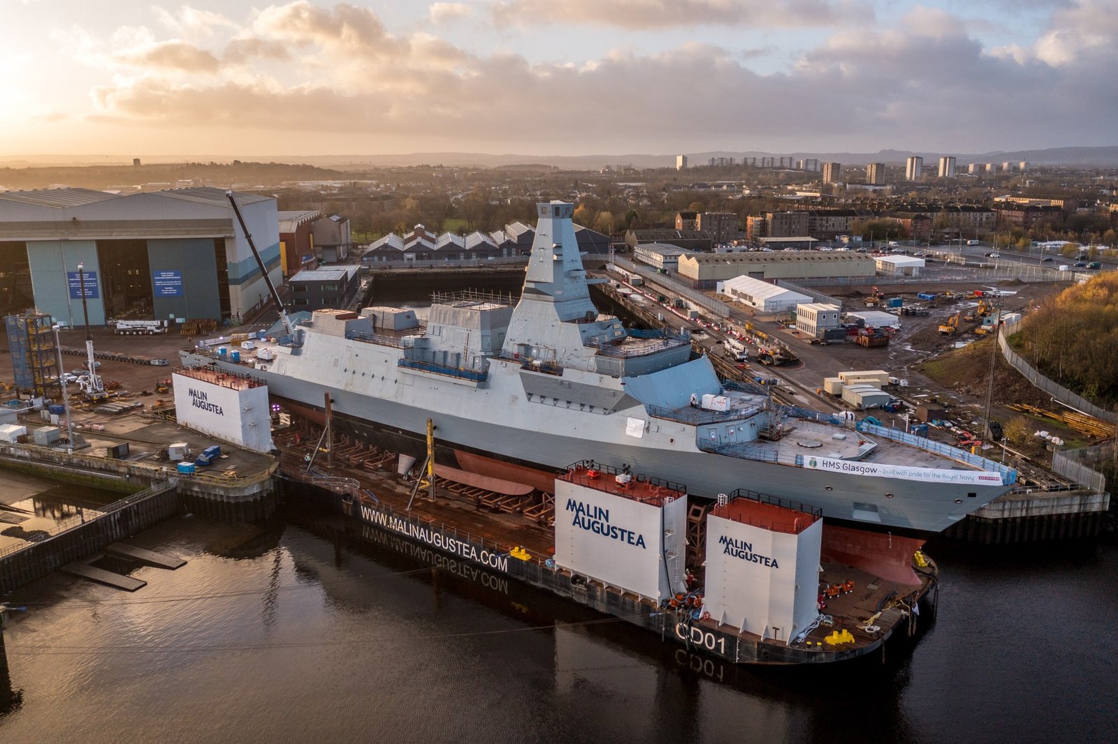 Type 26 frigate HMS Glasgow on a barge on the River Clyde in Glasgow before its launch in November 2022, a file photo of Clyde-built warship construction.