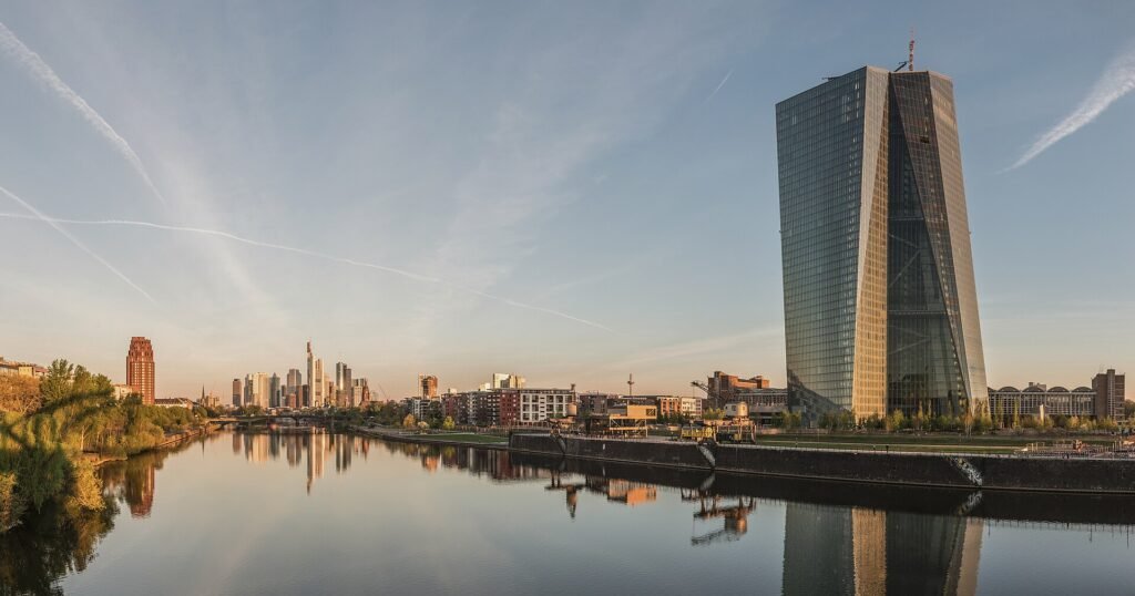The European Central Bank headquarters and the Frankfurt skyline at dawn