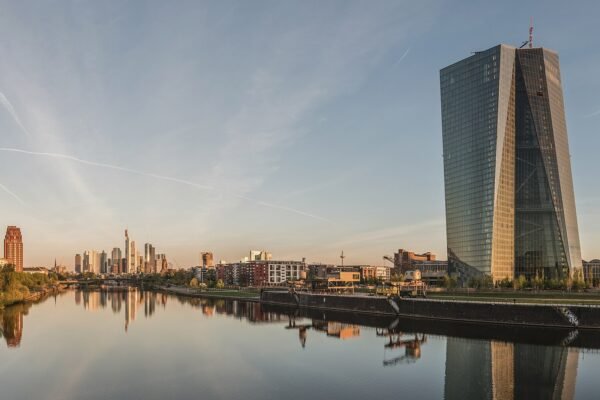 The European Central Bank headquarters and the Frankfurt skyline at dawn